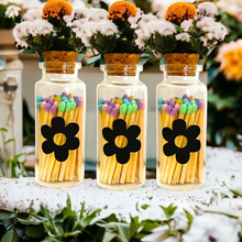 Load image into Gallery viewer, Spring Colored Tip Matches in glass jar with cork top, spring colored matches, easter decor, Flower shaped match striker on front of Vial.
